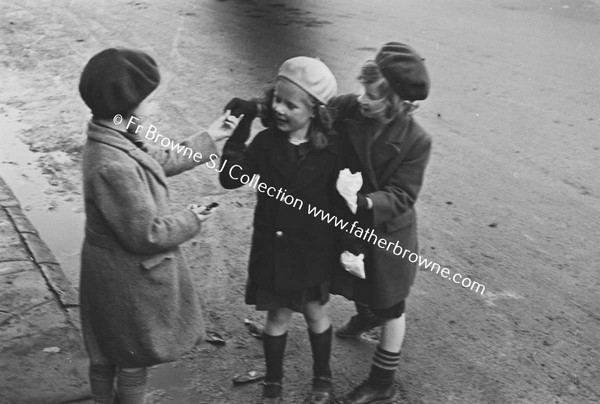 CHILDREN PLAYING IN STREET